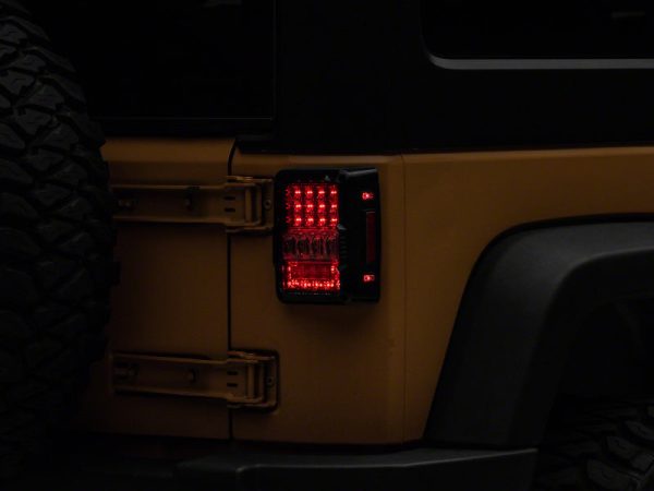 Raxiom 07-18 Jeep Wrangler JK Axial Series Lux LED Tail Lights- Blk Housing (Clear Lens) Cheap