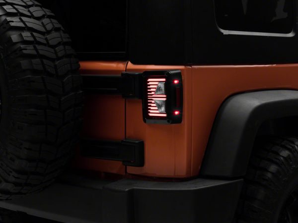 Raxiom 07-18 Jeep Wrangler JK Axial Series Vision LED Tail Lights- Blk Housing (Clear Lens) Cheap